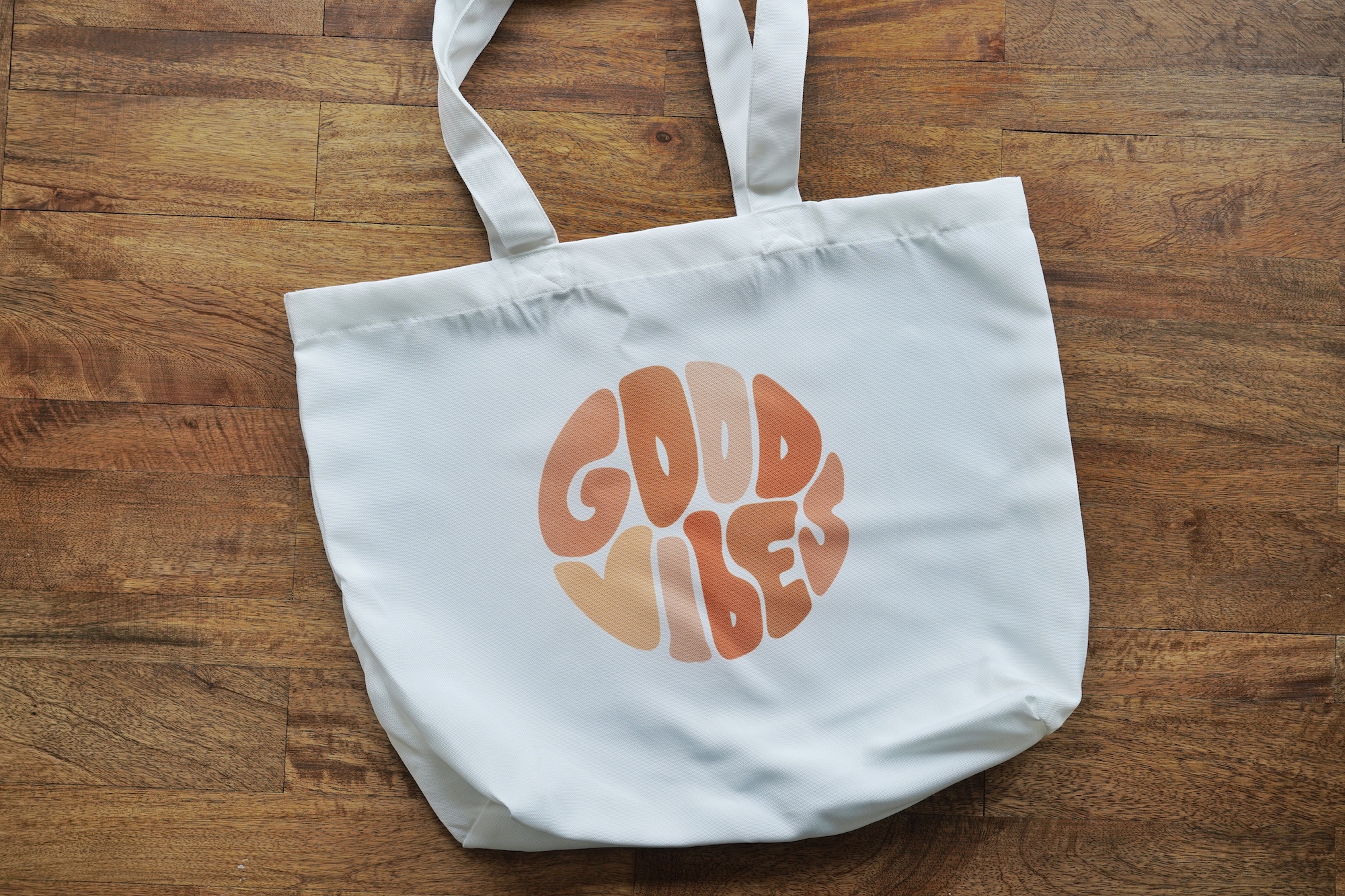 Canvas tote bag with orange good vibes image